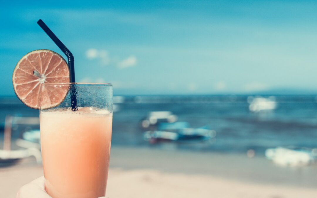 citrus drink with cup and fruit slice selective focal photo