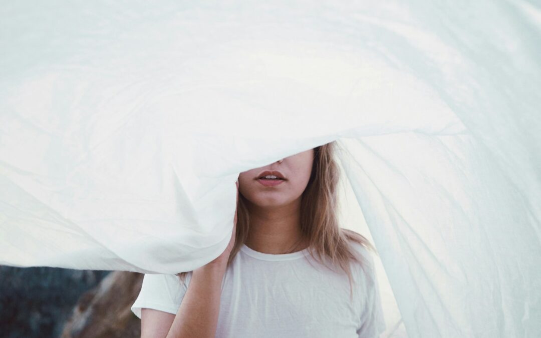 woman under white cloth