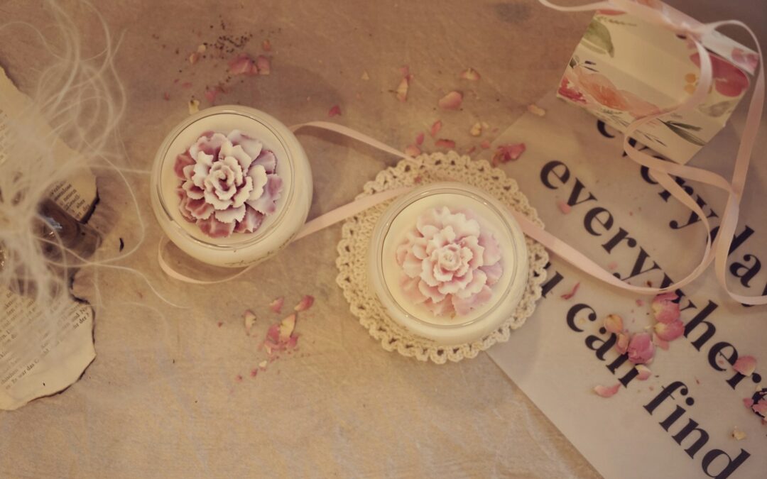a group of cups with flowers in them